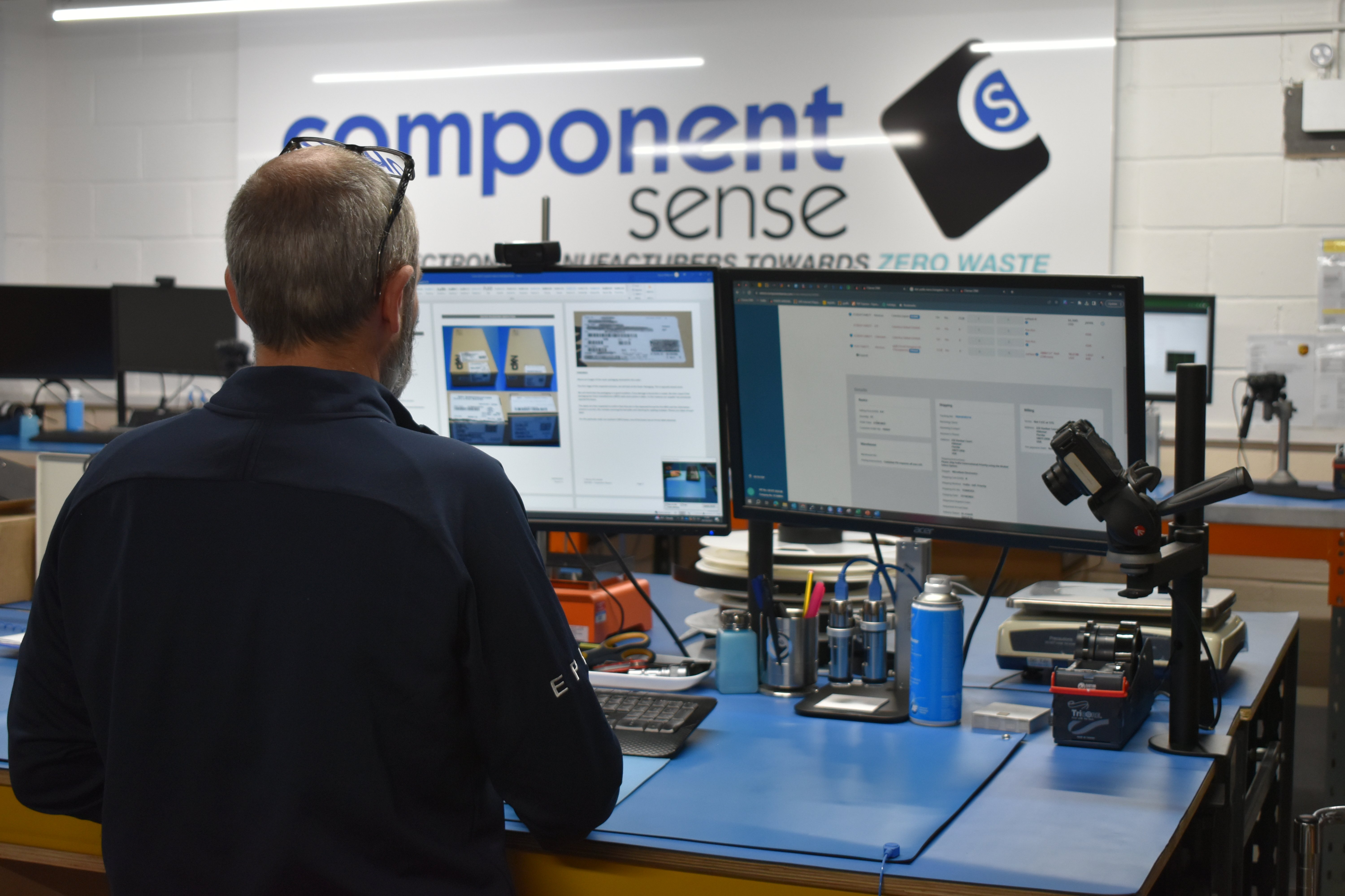Component Sense employee analysing the box containing electronic components.