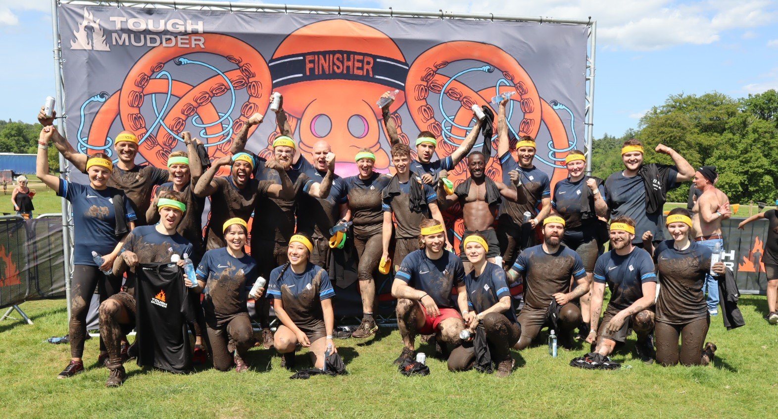Component Sense team photo from the finish line of the Tough Mudder event.